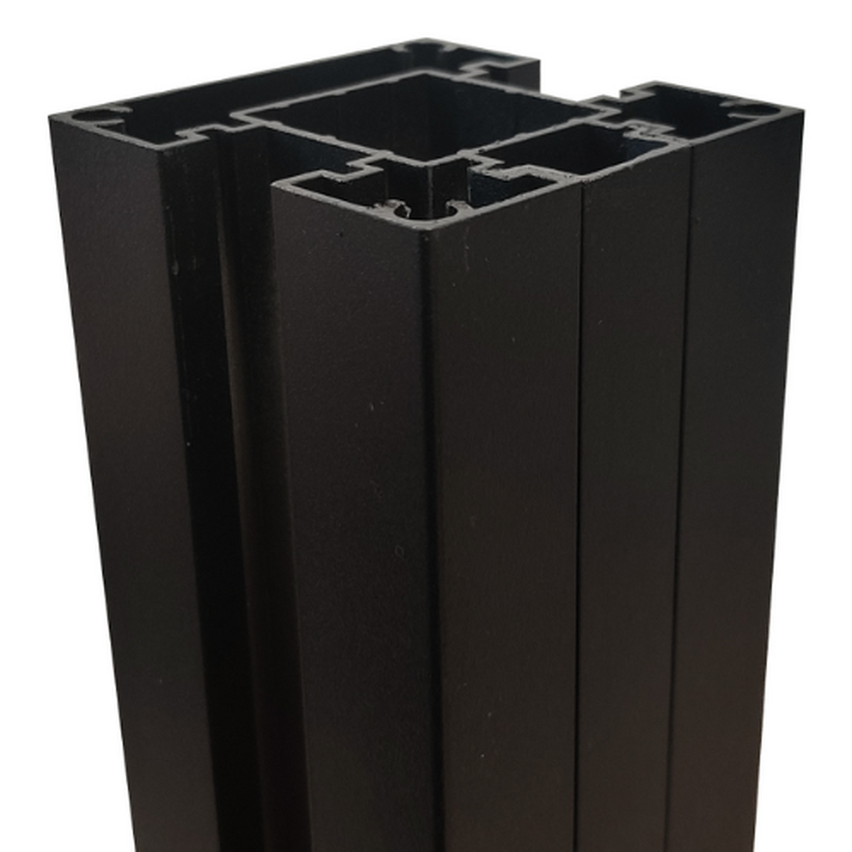 Black aluminium fence post showing the internal channels at the top