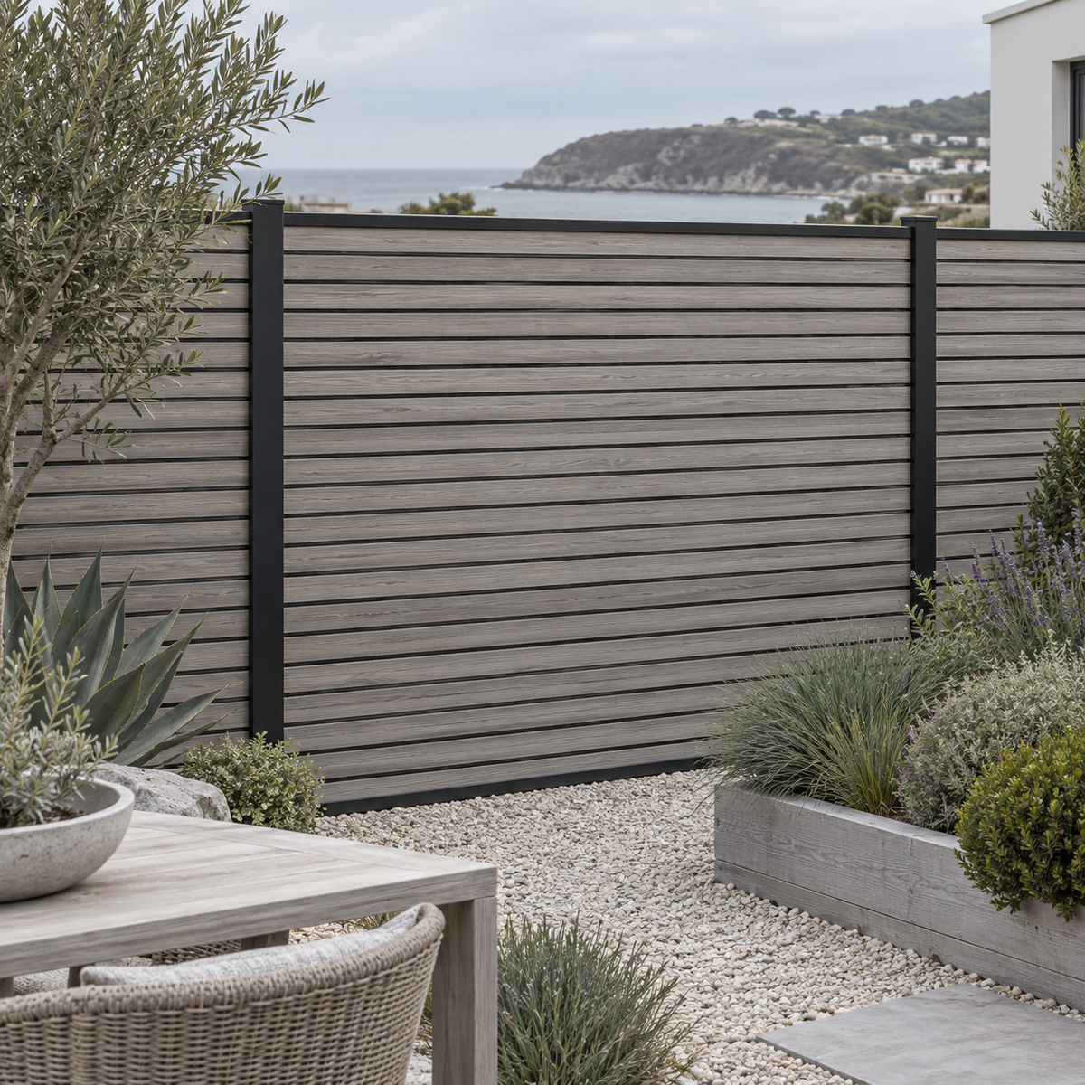 Driftwood slatted composite fencing with narrow slat faces and slim black rails — generated garden illustration