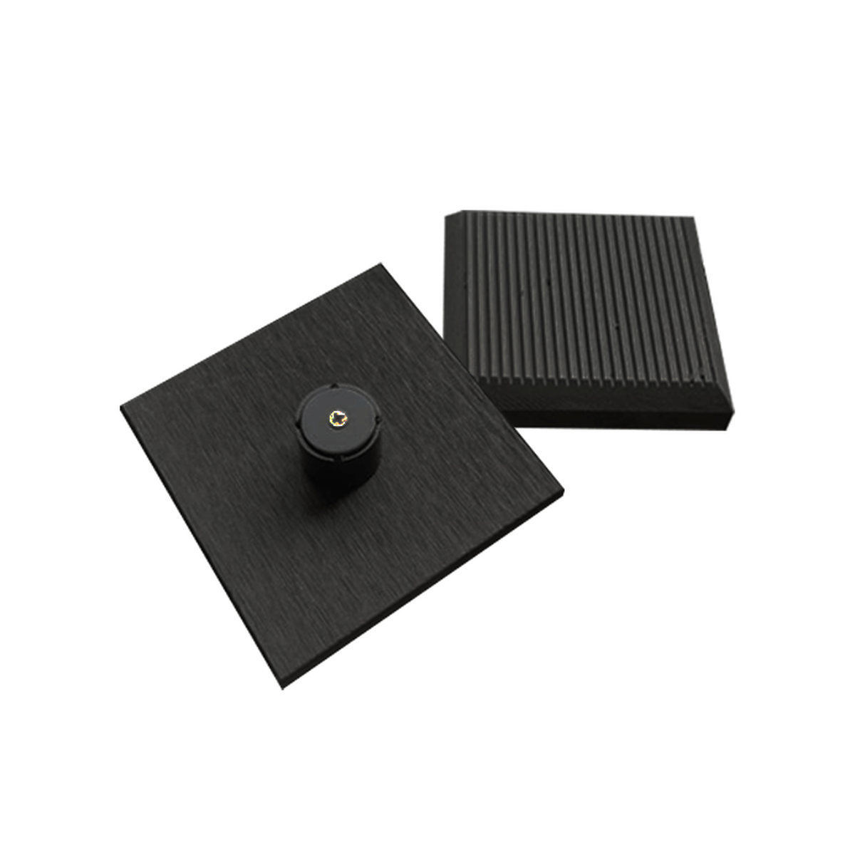 Charcoal composite fence-post caps showing the top and underside