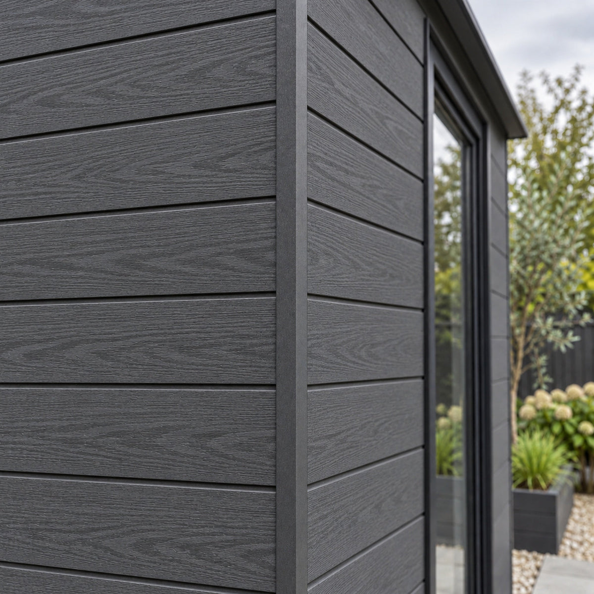 Anthracite Grey angle trim on a garden building — design visualisation