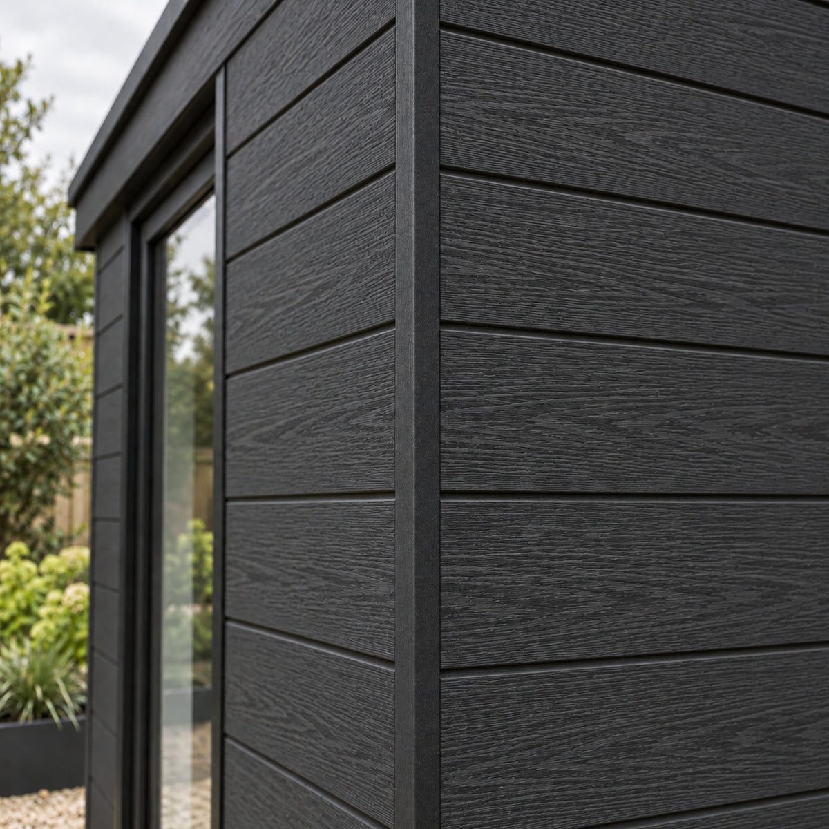 Charcoal Black angle trim on a garden building — design visualisation