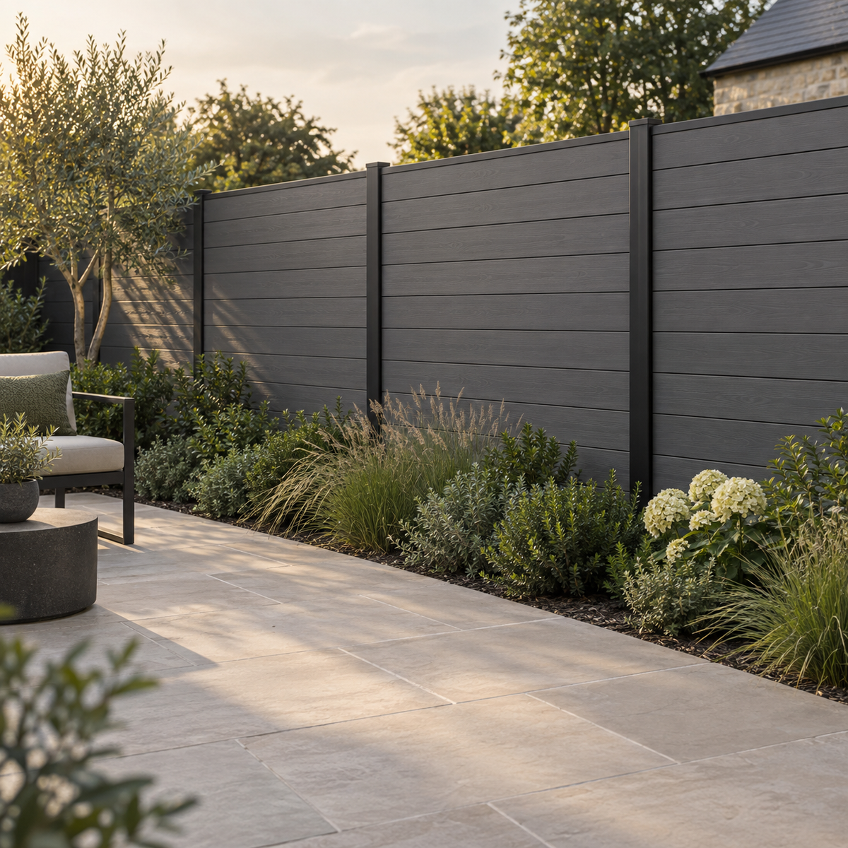 Composite fencing with black aluminium posts