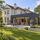 Anthracite Grey Prestige slatted cladding — installed architectural visualisation