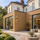 Natural Oak Prestige slatted INTERNAL corner trim — installed architectural visualisation