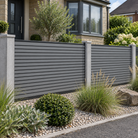 Graphite Grey slatted composite fencing with narrow slat faces and slim black rails — generated garden illustration